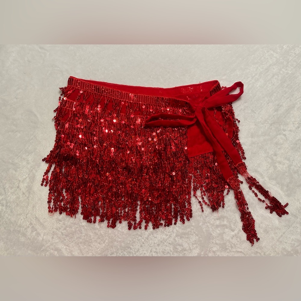 Red sequin & fringe wrap skirt. Great for Halloween, dance or just a night out.